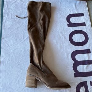 Worn twice knee high boots